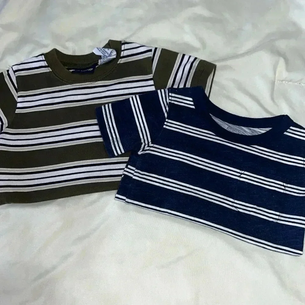 A lot of 2, 12 month stripped tops